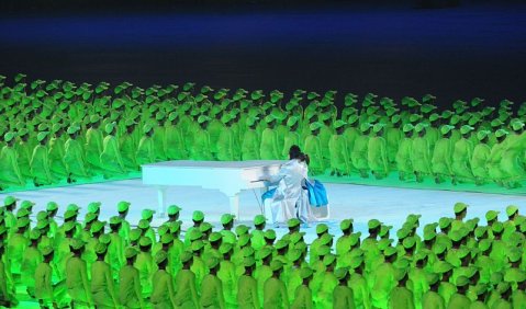 Chinese pianist Lang Lang and 5-year-old Li Muzi play a romantic tune together to welcome a brand-new age in the storied history of the People's Republic of China during the starlight segment of the Opening Ceremony of the XXIX Olympiad on Aug. 8. 
